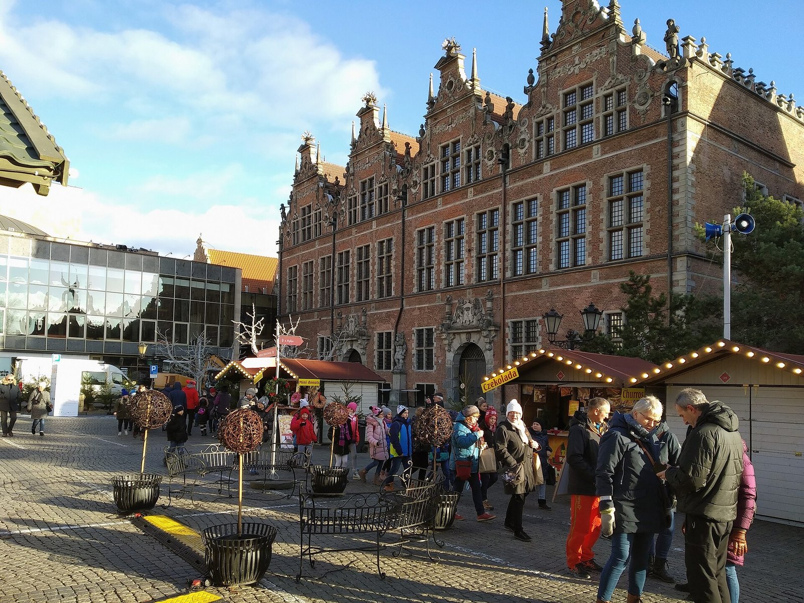 Gdańsk Christmas Market by day, stalls on Targ Węglowy in front of the Great Armoury
